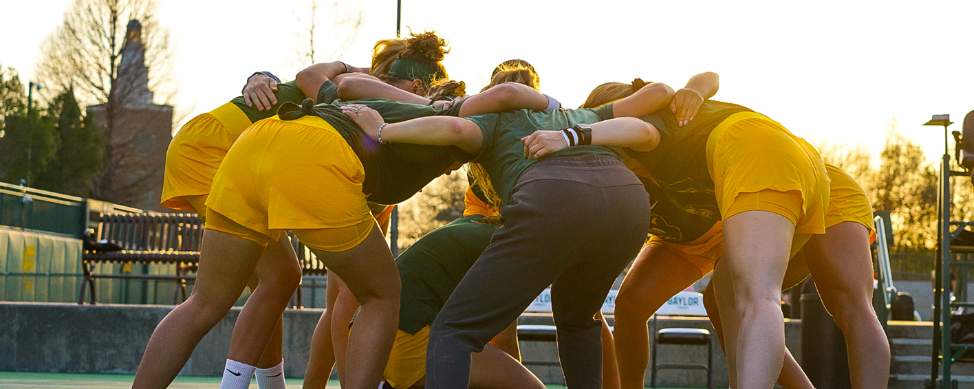 Baylor Women's Tennis team in a huddle